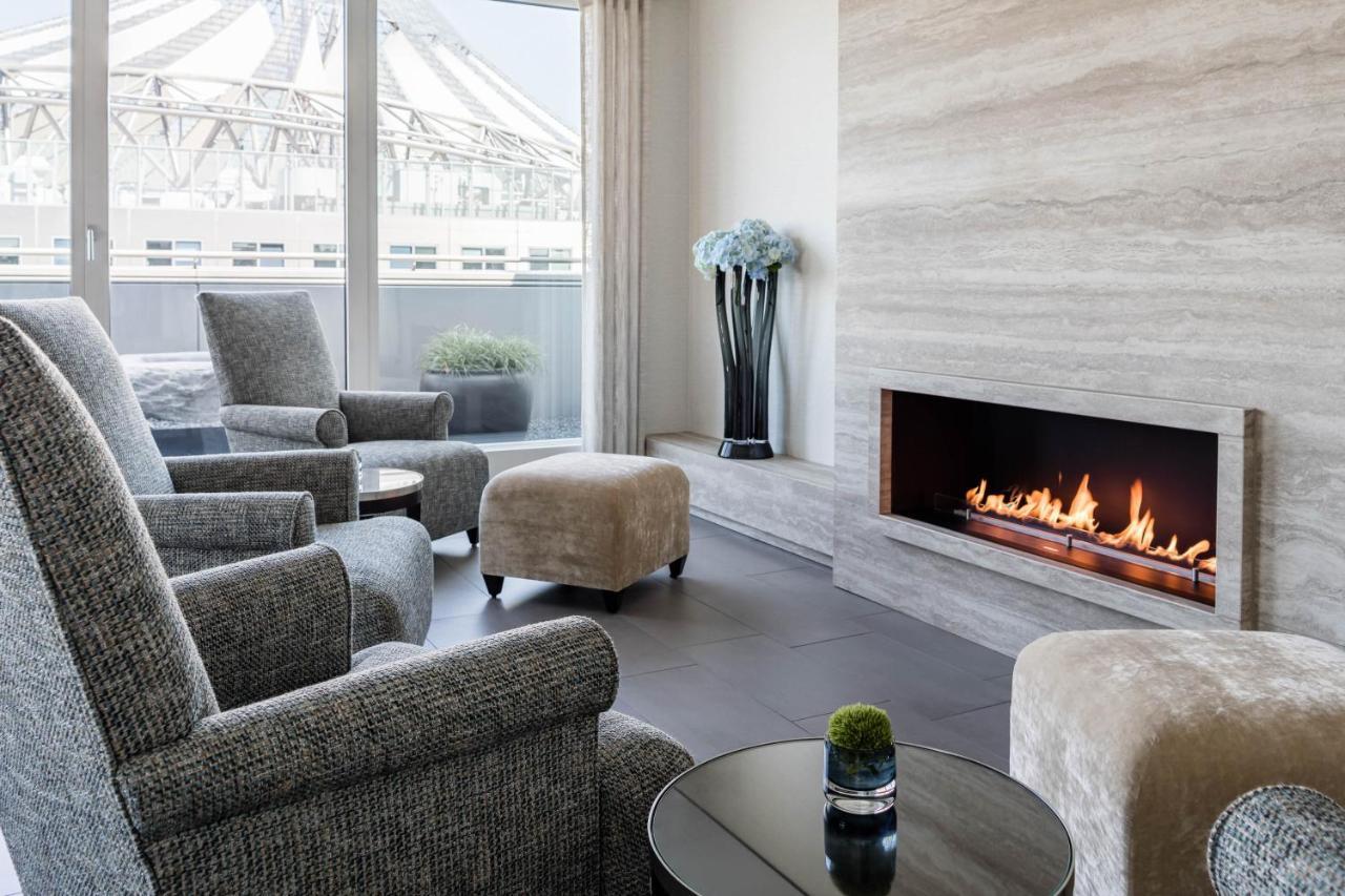 The Mandala Berlin, A Member Of Design Hotels Exterior foto A fireplace in a living room