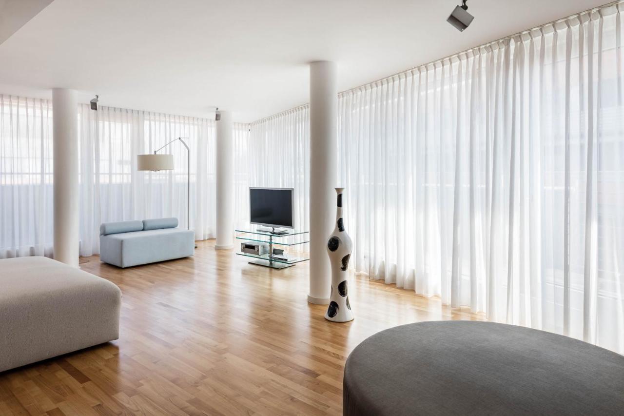The Mandala Berlin, A Member Of Design Hotels Exterior foto Curtains in a living room