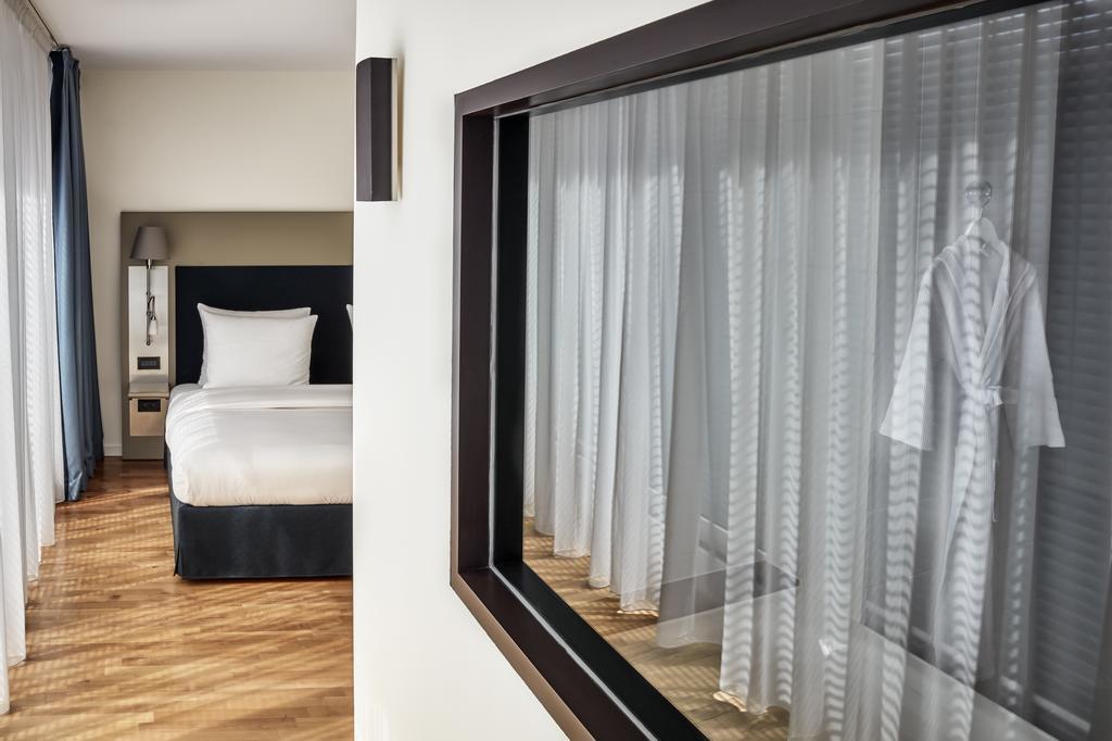 The Mandala Berlin, A Member Of Design Hotels Exterior foto A room at the hotel